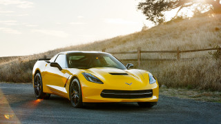 Yellow sports car road fence - a sun free wallpaper for desktop