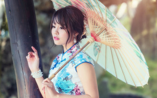 Woman umbrella park blue dress - an umbrella free wallpaper