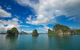 Rocky island reflection clouds sky - the middle of a body free wallpaper