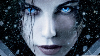 Woman blue eyes sword snow - gothic art free wallpaper for desktop