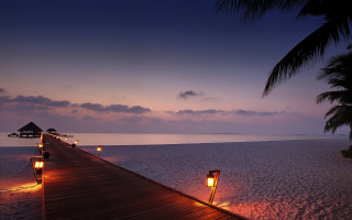 Pier lights night beach hut - a hut free wallpaper