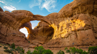 Large rock arch trees sky - betye saar free wallpaper
