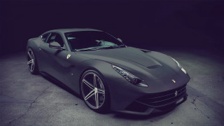 Grey sports car dark room 2 - a grey sports car free wallpaper