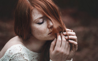 Freckled hair woman holding hands - freckle free wallpaper