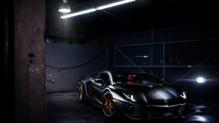 Black sports car garage night - a bright light free wallpaper