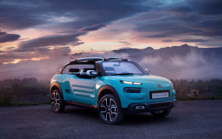 Blue car gravel road mountains - photoreal free wallpaper