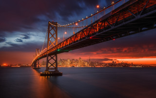 Bridge water city night lights 40 - a red sky free wallpaper