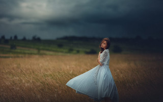 Woman white dress field cloudy 2 - dark cloud free wallpaper