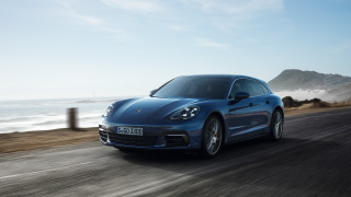 Blue porsche panamera ocean mountains - 4k uhd image free wallpaper
