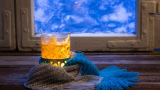 Tea glass blue hat window - a snowy scene free wallpaper