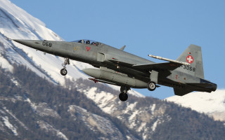 Military jet mountain cross plane - the side of the plane free wallpaper