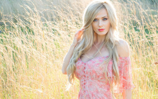 Pink dress woman field wind - tall grass free wallpaper