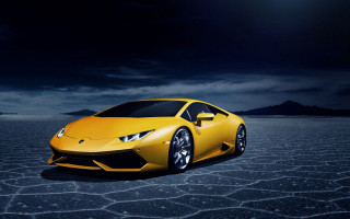 Yellow sports car desert night - a desert area free wallpaper