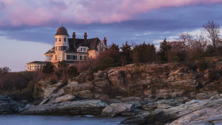 Cliffside house ocean forest sunset - a large house free wallpaper