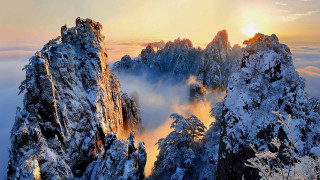 Snowy mountain sunset clouds forest - a sun free wallpaper for desktop