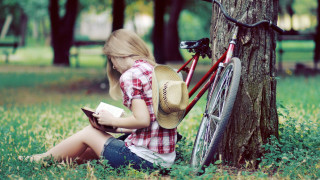 Girl bicycle reading tree grass - a bicycle free wallpaper
