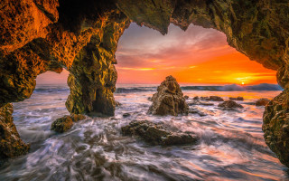 Sunset rocky beach cave ocean - a sunset view free wallpaper