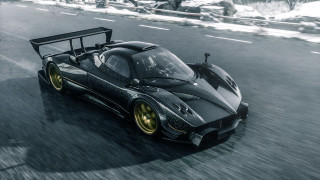 Black race car snow road - tire free wallpaper