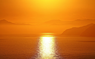 Sunset mountains ocean boat sky - sunrise time free wallpaper
