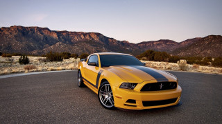 Yellow mustang parking lot mountains - a parking lot free wallpaper