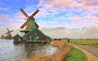 Windmill river road field person - a windmill free wallpaper