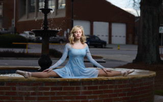 Woman sitting fountain blue dress - front of a building free wallpaper