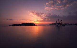 Boat sunset clouds cityscape mountains - a boat free wallpaper