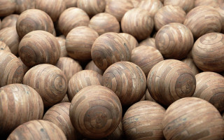 Wooden balls pyramid kinetic art - a pyramid free wallpaper