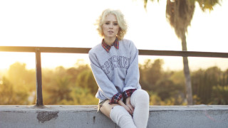 Woman sitting ledge blonde sweater - plaid free wallpaper