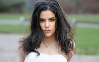 Woman long hair park bokeh 3 - head and shoulders portrait free wallpaper