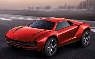 Red sports car city skyline - a foggy sky free wallpaper for desktop