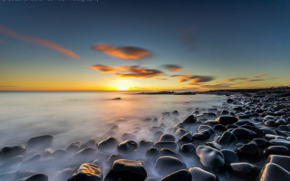 Beach rocks water sunset clouds 3 - dave allsop free wallpaper