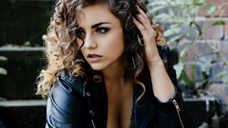Curly hair black jacket portrait - curly free wallpaper