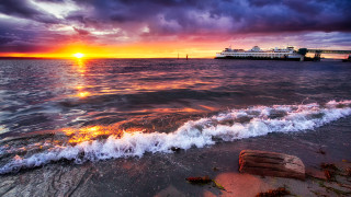 Sunset boat waves distant ship - the shore free wallpaper