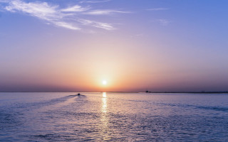 Boat sunset distant mountains ocean - sunrise free wallpaper for desktop