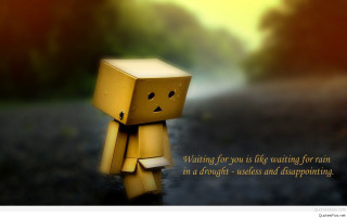 Yellow toy sad face raining - the side of it free wallpaper