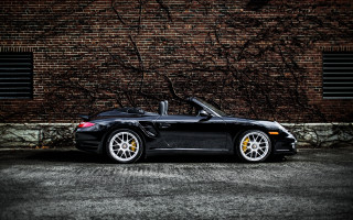 Black sports car brick wall 8 - a black car free wallpaper