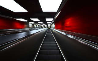 Train tunnel red walls longexposure - a train track free wallpaper
