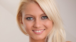 Blonde woman blue eyes smiling 2 - headshot free wallpaper