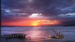 Sunset boat pier cloudy sky - a pier in the background free wallpaper