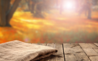 Cloth wooden table autumn sunset - a cloth free wallpaper