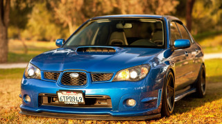 Blue car autumn leaves outdoors - golden hour free wallpaper