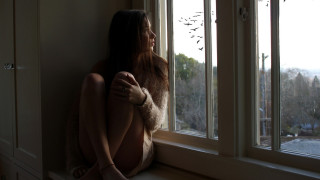 Woman sitting window outside trees - a window sill free wallpaper