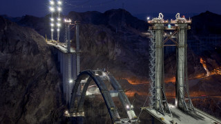 Large bridge lights mountains night - a bunch of lights free wallpaper