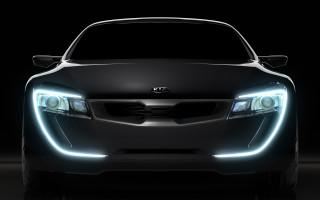 Car bright headlight dark background - a bright light free wallpaper