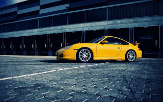 Yellow sports car brick road 3 - a large window free wallpaper