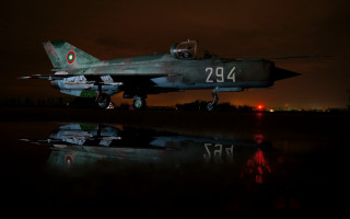 Fighter jet night reflection runway - top of a runway free wallpaper