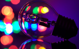 Lightbulb colorful lights reflection macro - a light bulb free wallpaper