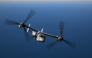 Military plane ocean clear day - a propeller free wallpaper