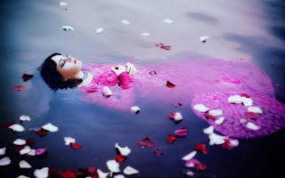 Woman floating petals water photorealistic - petal and petals free wallpaper